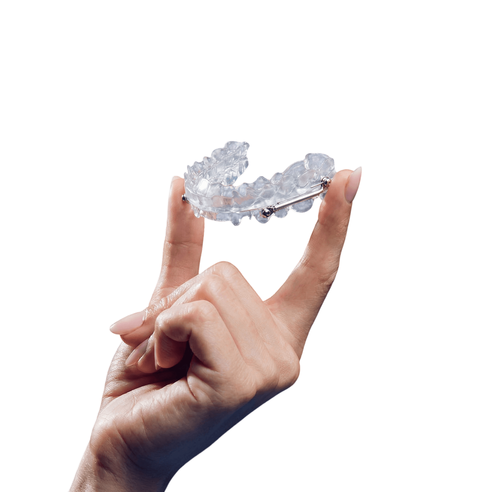 Woman holding a mandibular advancement device